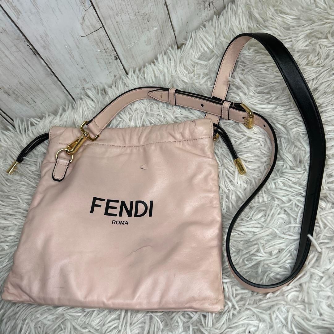 Authentic FENDI logo drawstring shoulder bag in pink leather and lamb w ...