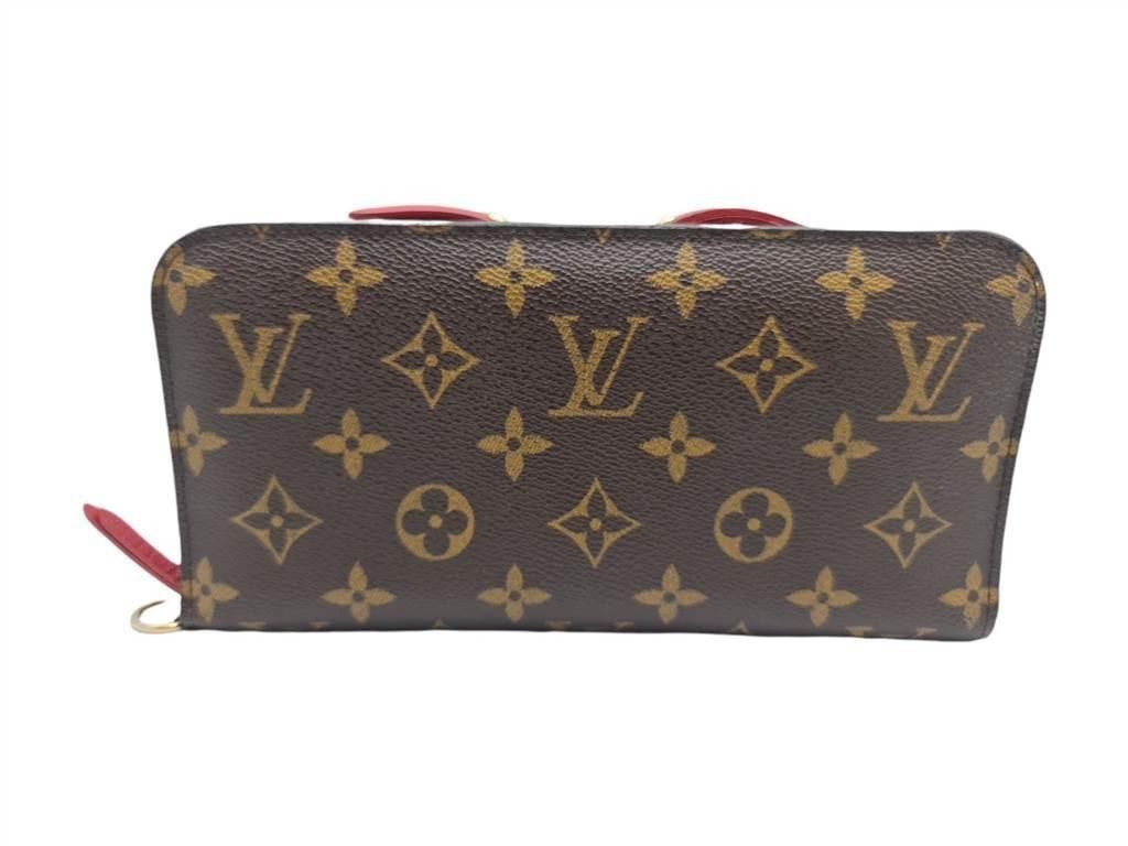 AUTHENTIC LOUIS VUITTON LV MONOGRAM INSOLITE RED INTERIOR LARGE WALLET / COMPACT CLUTCH (Category: Wallets & Card holders) located in Makati City. Submitted by maximum_happiness (Listing ID 1385023162, Image 2). Description: READ, READ, READ, READ THE ITEM DESCRIPTION GUARANTEED AUTHENTIC OR FULL REFUND MORE DETAILED PICS HERE - https://jpegbay.com/gallery/008656557-.html#1 MONOGRAM CANVAS EXTERIOR – GOLD TONE METAL HARDWARE – RED CROSS GRAIN LEA