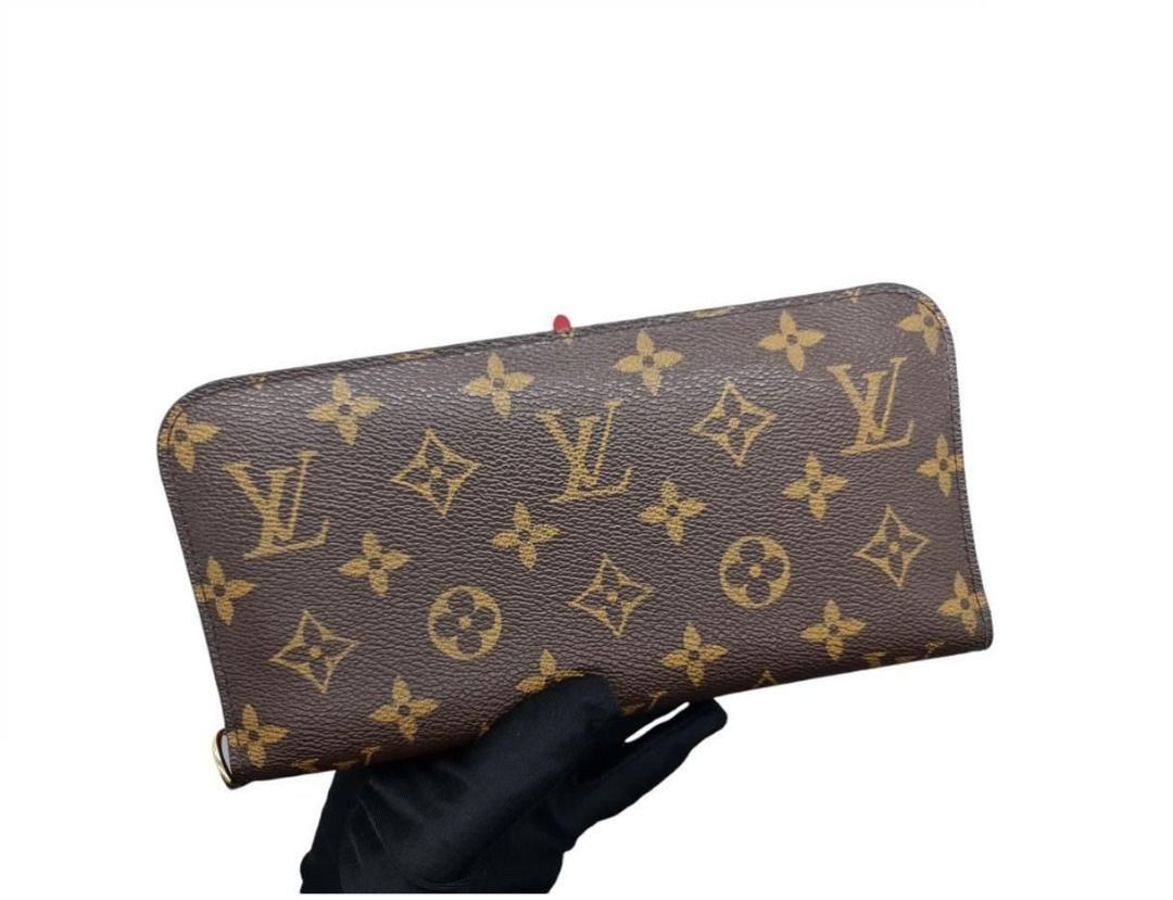 AUTHENTIC LOUIS VUITTON LV MONOGRAM INSOLITE RED INTERIOR LARGE WALLET / COMPACT CLUTCH (Category: Wallets & Card holders) located in Makati City. Submitted by maximum_happiness (Listing ID 1385023162, Image 3). Description: READ, READ, READ, READ THE ITEM DESCRIPTION GUARANTEED AUTHENTIC OR FULL REFUND MORE DETAILED PICS HERE - https://jpegbay.com/gallery/008656557-.html#1 MONOGRAM CANVAS EXTERIOR – GOLD TONE METAL HARDWARE – RED CROSS GRAIN LEA