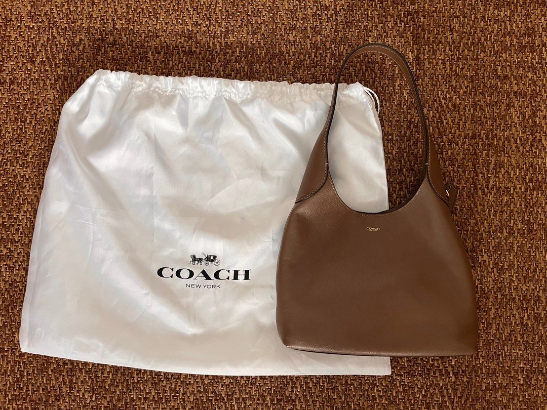 Coach Brooklyn Bag 28 (Category: Luxury Bags & Wallets) located in Paranaque City. Submitted by threadup (Listing ID 1384839158, Image 1). Description: • Coach Brooklyn 28 • Dark Stone • Excellent condition •Used thrice only • Too small for me • Bought in Coach Hawaii • PRICE FIXED (people asking for the last price will not be entertained).