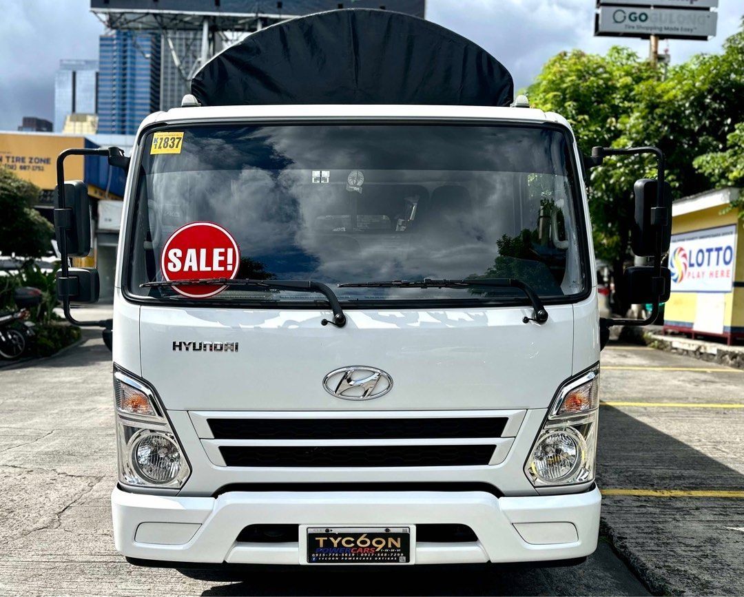 HYUNDAI HD45 GT 4W (Category: Heavy Vehicles) located in Pasig City. Submitted by tycoon.cars (Listing ID 1384910103, Image 2). Description: HYUNDAI HD45 GT 4W - 2022 Model - 3,XXX Original Mileage - 14-footer Dropside - Creamy White - Manual Transmission - 2.8L Diesel Engine - SUPER FRESH - RARE UNIT We Don’t Sell Cars, We Sell Dreams. BUY•SELL•TRADE•CONSIGN•FINANCING Tycoon Powercars www.tycoonpowercars.com Autocamp #100 Ortigas Avenue, Pasig C