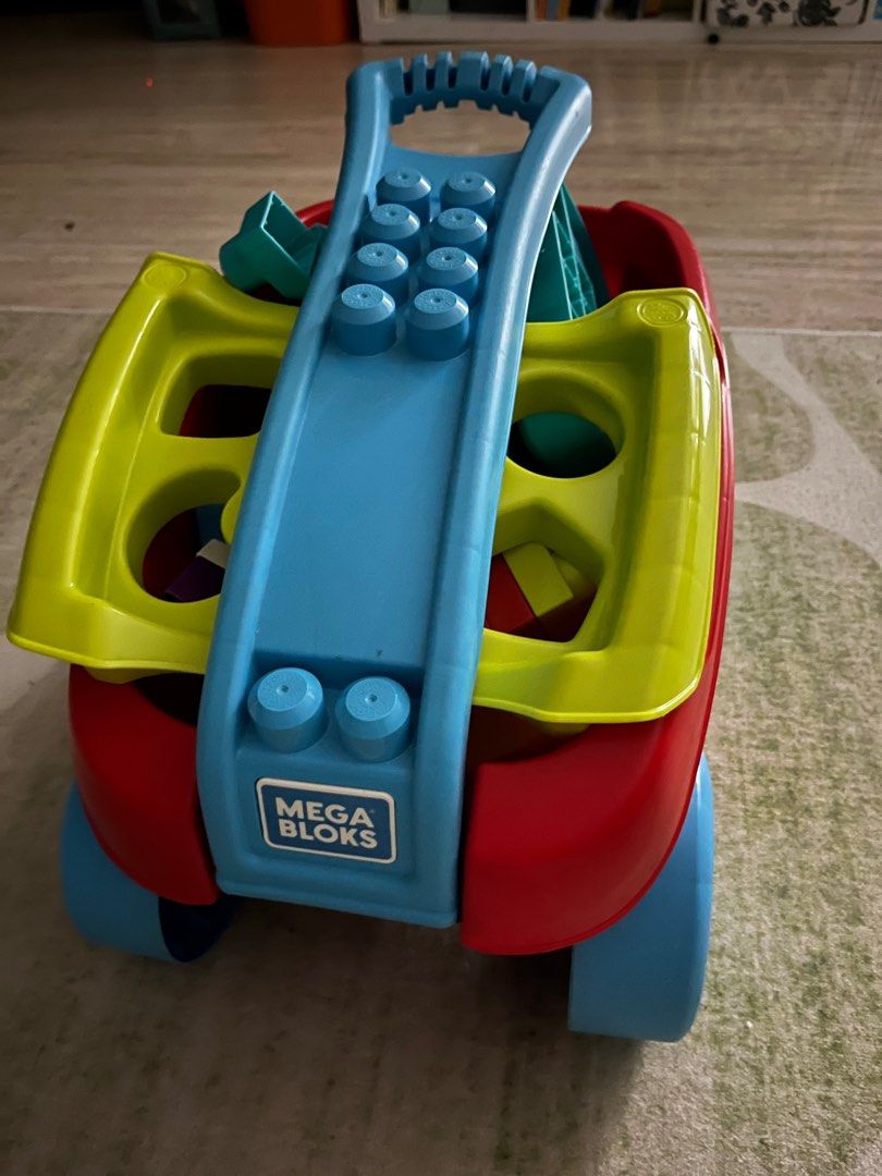 MEGA blocks (Category: Everything Else) located in Singapore. Submitted by ellen52217 (Listing ID 1384995165, Image 3). Description: 1, trolley with various shapes 2, cat & dog rolling down the track .