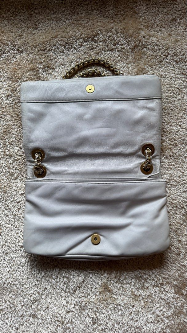 Nina ricci two way bag (Category: Luxury Bags & Wallets) located in Tagaytay City. Submitted by ashhh_leyyyy (Listing ID 1384869185, Image 3). Description: Like new condition Some pullers have a plastic pa.