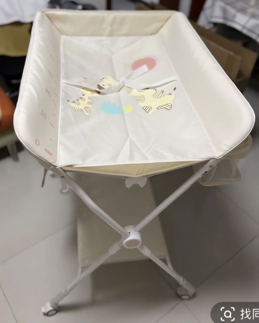 Portable changing Table (Category: Changing Tables & Stations) located in Paranaque City. Submitted by mystuffmel (Listing ID 1384847166, Image 1). Description: PAYMENT FIRST-NO COD MOP:Gcash only same day delivery once paid complete set with no box. side pockets and storage for lotion, diaper, etc..