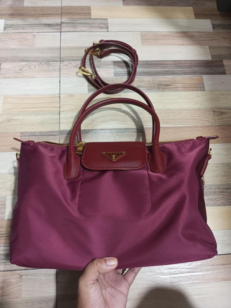 Prada tessuto 2 way bag (Category: Luxury Bags & Wallets) located in Baguio. Submitted by brandeditems16 (Listing ID 1385039076, Image 1). Description: In excellent condition No flaws or damage Dustbag inclusion only Negotiable price.