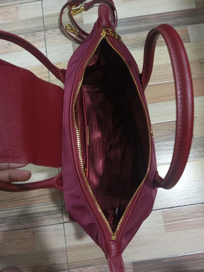Prada tessuto 2 way bag (Category: Luxury Bags & Wallets) located in Baguio. Submitted by brandeditems16 (Listing ID 1385039076, Image 3). Description: In excellent condition No flaws or damage Dustbag inclusion only Negotiable price.