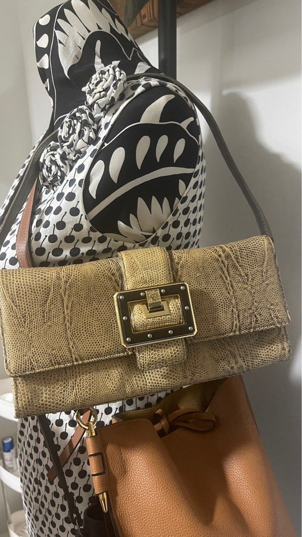 Rare authentic Anne Klein bag (Category: Luxury Bags & Wallets) located in Las Pinas. Submitted by tatz06 (Listing ID 1384945679, Image 1). Description: Rare exotic animal shoulder or kili or clutch bag. Come with an extra metal strap/sling #rare #exotic #unique #clutch.