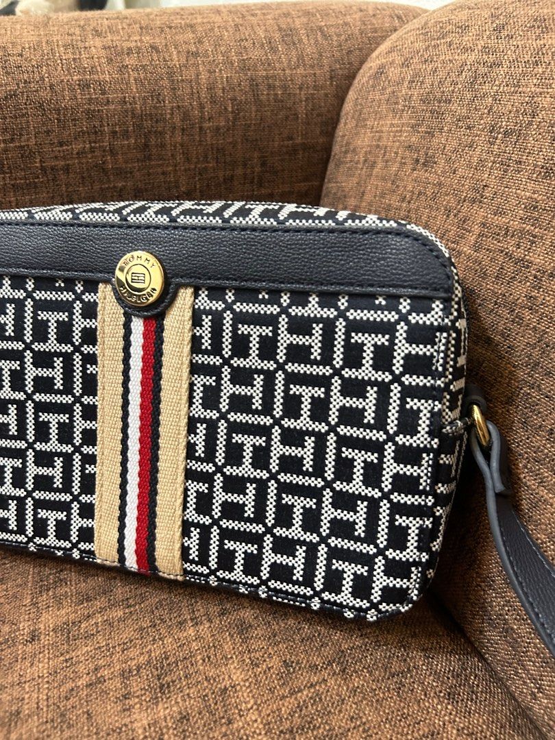 TOMMY HILFIGER CROSSBODY BAG (Category: Cross-body Bags) located in Del Monte. Submitted by sinaya.co (Listing ID 1385030180, Image 3). Description: FROM CANADA — SELLING FOR ₱3,000 ONLY ✅ 100% AUTHENTIC TOMMY HILFIGER CROSSBODY — STYLE 443317, DEPT/RAYON 6025 ✅ BRAND NEW WITH TAGS — IMPORTED DIRECTLY FROM CANADA ✅ CHIC MONOGRAM STYLE — RARE, HARD TO FIND LOCALLY PRODUCT DETAILS: • Iconic TH monogram woven fabric in navy & white • Signature red-w