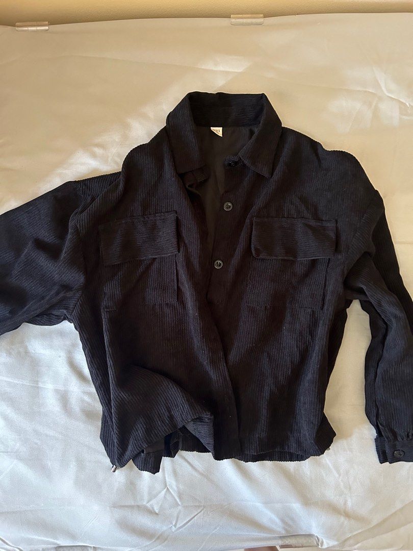 [3 FOR $5] Black Corduroy Overshirt Jacket - Size L (Category: Coats, Jackets and Outerwear) located in Singapore. Submitted by 4.44am (Listing ID 1380488801, Image 2). Description: Stylish black corduroy overshirt jacket. Features a classic button-down design with two front pockets. Perfect for layering or wearing on its own. Great condition, ready to wear! Ribbed material Barely worn Fits S-M, oversized.