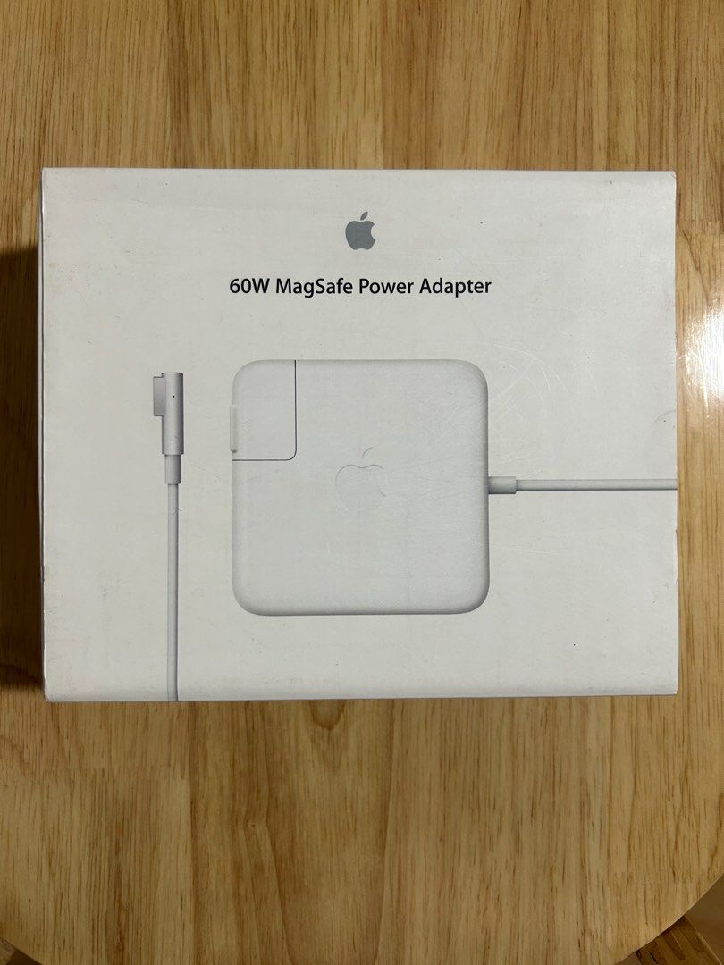 Adaptor/ Apple laptop charger (Category: Chargers) located in Marilao. Submitted by clearance4acause.1 (Listing ID 1385186732, Image 1). Description: never used. spare for my old laptop.
