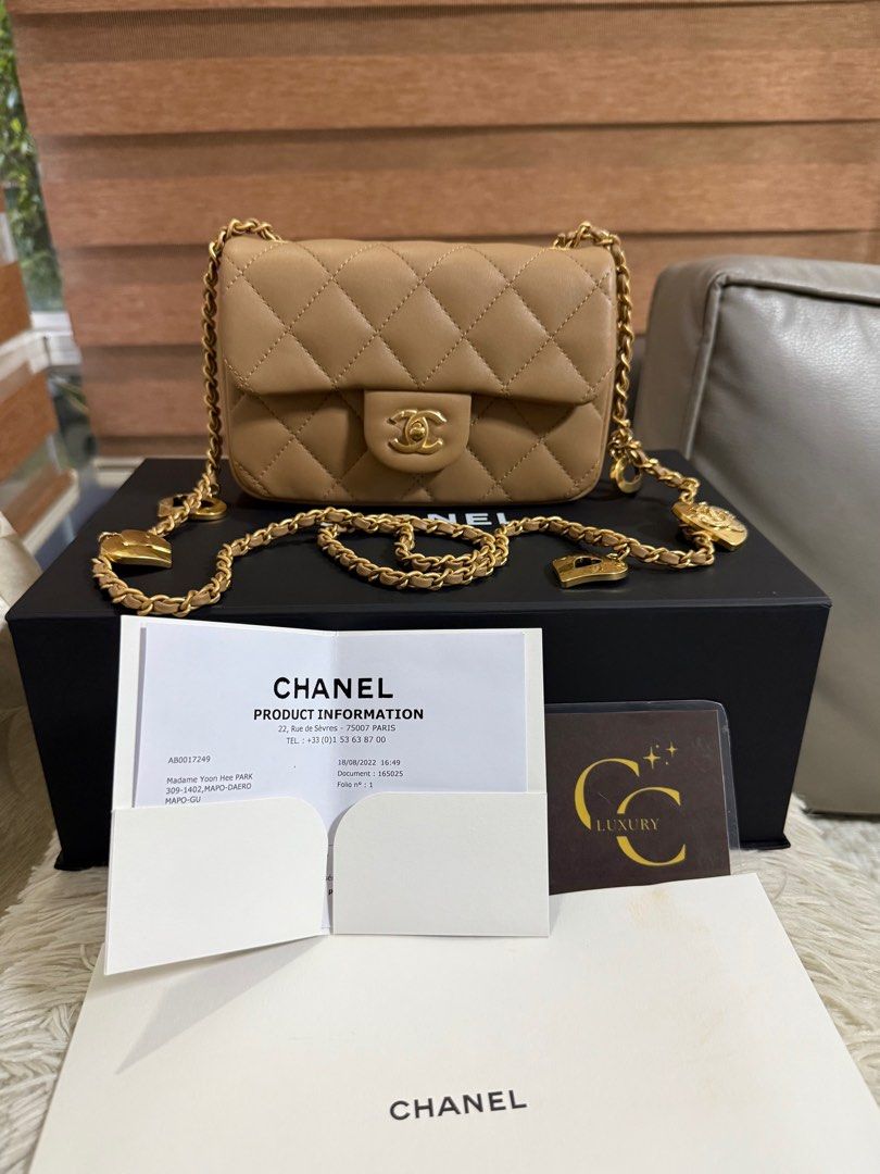 Chanel Mini Rectangle Flap Lambskin Beige (Category: Luxury Bags & Wallets) located in Manila. Submitted by ccluxuryy (Listing ID 1385197476, Image 1). Description: Chanel Mini Rec Heart Charms Flap in Caramel / Nude GHW Lambskin Leather Microchipped Excellent condition, no rubs, plastic film still intact Comes full box with gift receipt Retails for P360k 🥺 P240k only Location: Merville, Paranaque Meet up: MOA, DLSU, Newport, Greenbelt, BGC Deli