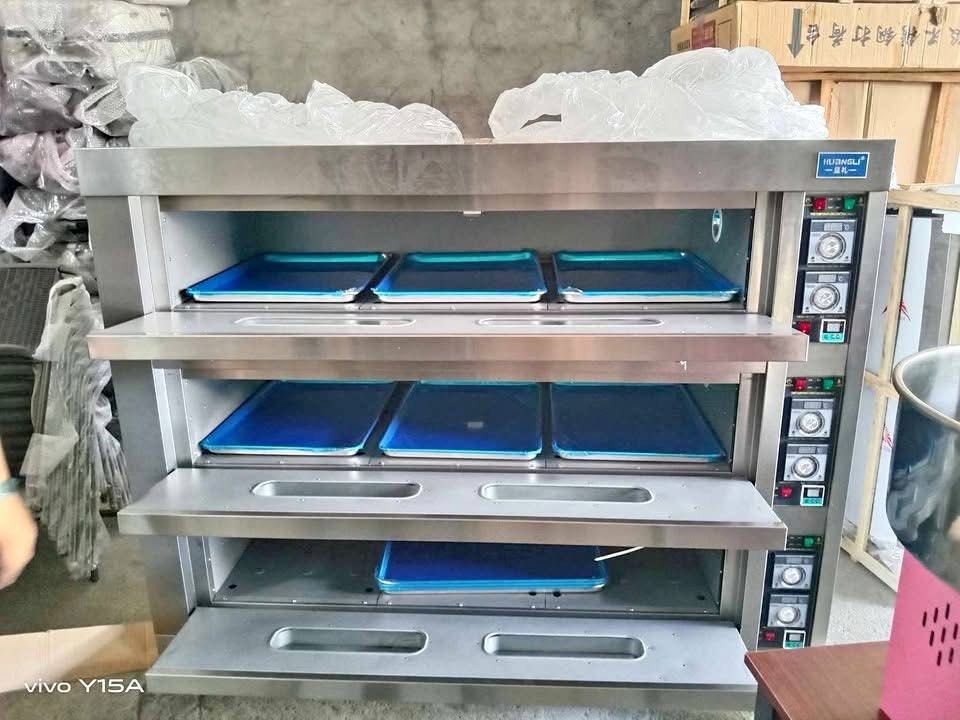 COMMERCIAL ELECTRIC 3 DECK OVEN WITH 9 PLATES (Category: Ovens & Toasters) located in Taguig. Submitted by mgracelim38484 (Listing ID 1385058357, Image 1). Description: ELECTRIC 3 DECK OVEN WITH 9PLATES (MANUAL) SPECIFICATIONS: Timing: 0-99 minutes Temperature: 0-400° Voltage: 380V Power: 240000W Switch: Air Switch 63A Capacity: 510L Weight: 280KG Bakeware: 60x40cm Dimensions: 169x83x153CM Internal Dimensions:130x63x153CM Feet/Wheels: 8CM ✅OUR WA