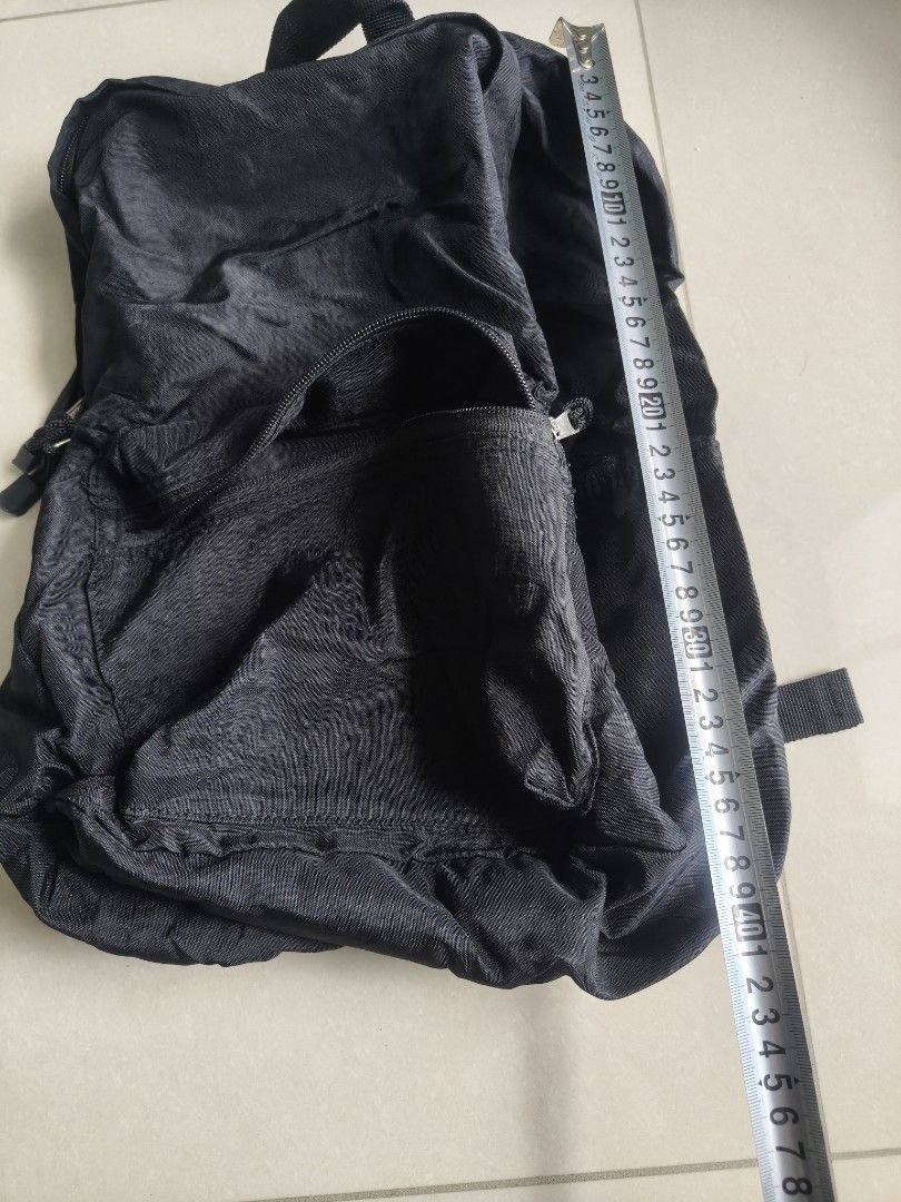 Foldable Backpack (Category: Backpacks) located in Singapore. Submitted by pggckk (Listing ID 1385150616, Image 2). Description: - Black foldable backpack - Lightweight material self collect from 822437.