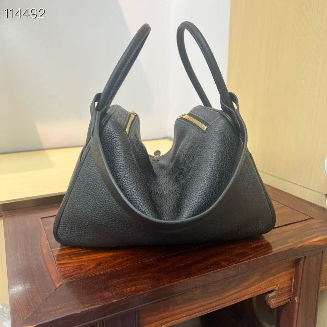 Hermes Lindy 26cm Clemence Black GHW (Category: Luxury Bags & Wallets) located in Pasig City. Submitted by wmsbags_2 (Listing ID 1385219290, Image 3). Description: Available❗️ VIP HANDMADE ✅Perfect workmanship ✅Fully hand stitched ✅Fine stamp & Code ✅100% Hardware materials structured ✅Real Leather ✅We do deliver (any) ✅ or meet up ( metro manila area) ✅We shipp all nationwide ✅Complete Inclusion MODE OF PAYMENT 📌CREDIT CARD & Cash accepted 📌Gc