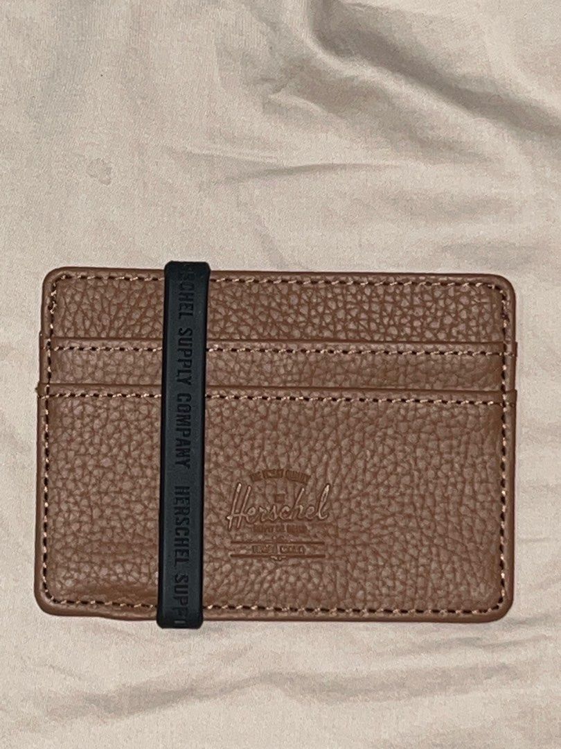 Herschel Charlie Cardholer (Category: Wallets & Card Holders) located in San Juan City. Submitted by hlcris (Listing ID 1385155507, Image 3). Description: Herschel Charlie Cardholder Wallet | Vegan Leather Brand New Color: Saddle Brown Original Price — ₱ 2, 490 Selling Price — ₱ 1, 899.