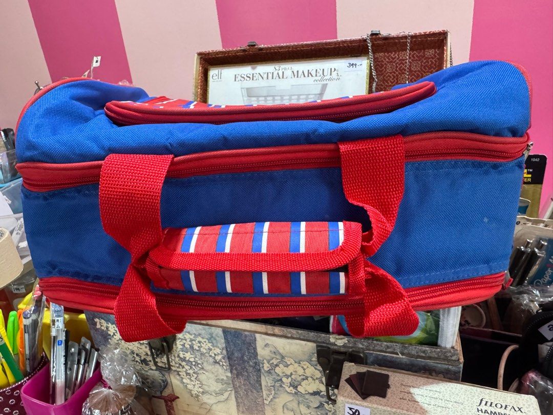 Insulated Hot/Cold Picnic Cooler Bag (Category: Food Organization & Storage) located in Pasig City. Submitted by meetmycloset (Listing ID 1385217895, Image 2). Description: Ideal for travel/outdoor picnic, camping moments. Dual zipper closure for easier, wider access. Brand: Macys 14 x 8 x 11.5 inches Handles + 1 long adjustable strap.