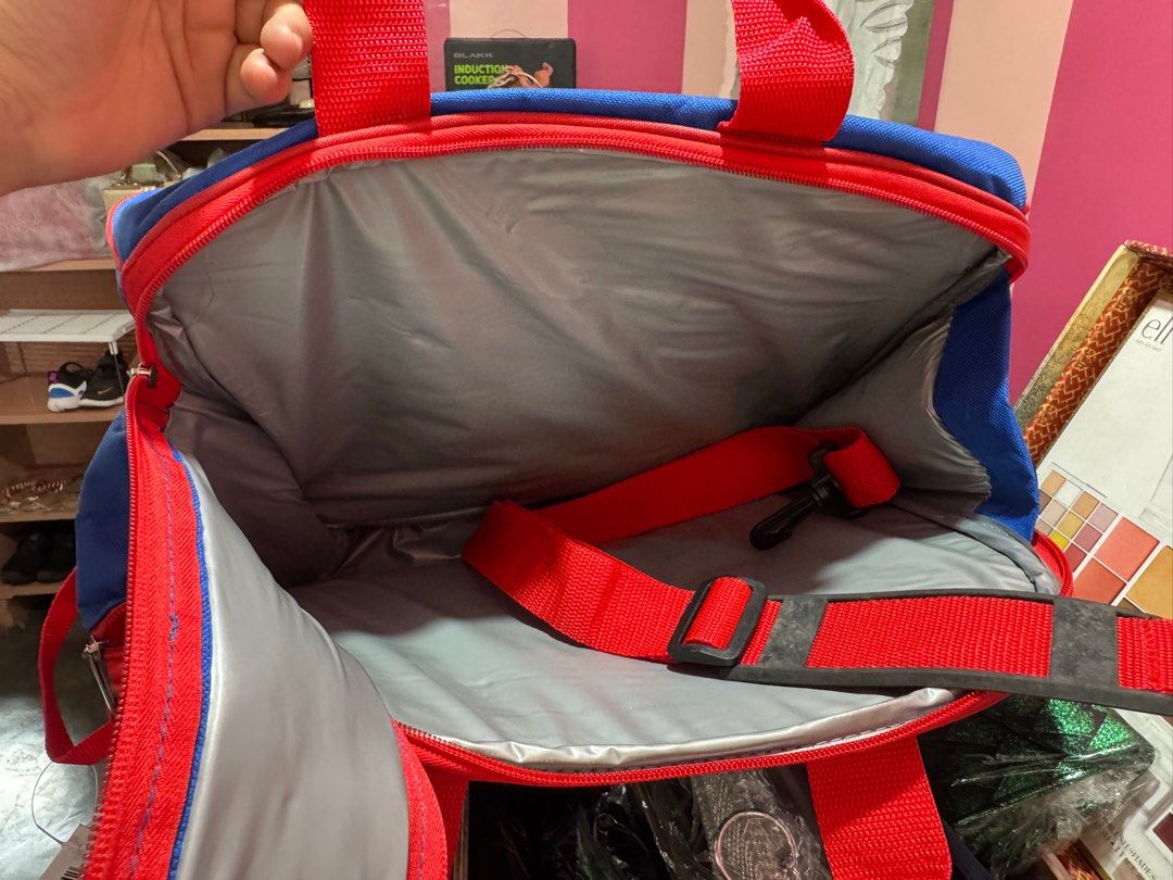 Insulated Hot/Cold Picnic Cooler Bag (Category: Food Organization & Storage) located in Pasig City. Submitted by meetmycloset (Listing ID 1385217895, Image 3). Description: Ideal for travel/outdoor picnic, camping moments. Dual zipper closure for easier, wider access. Brand: Macys 14 x 8 x 11.5 inches Handles + 1 long adjustable strap.