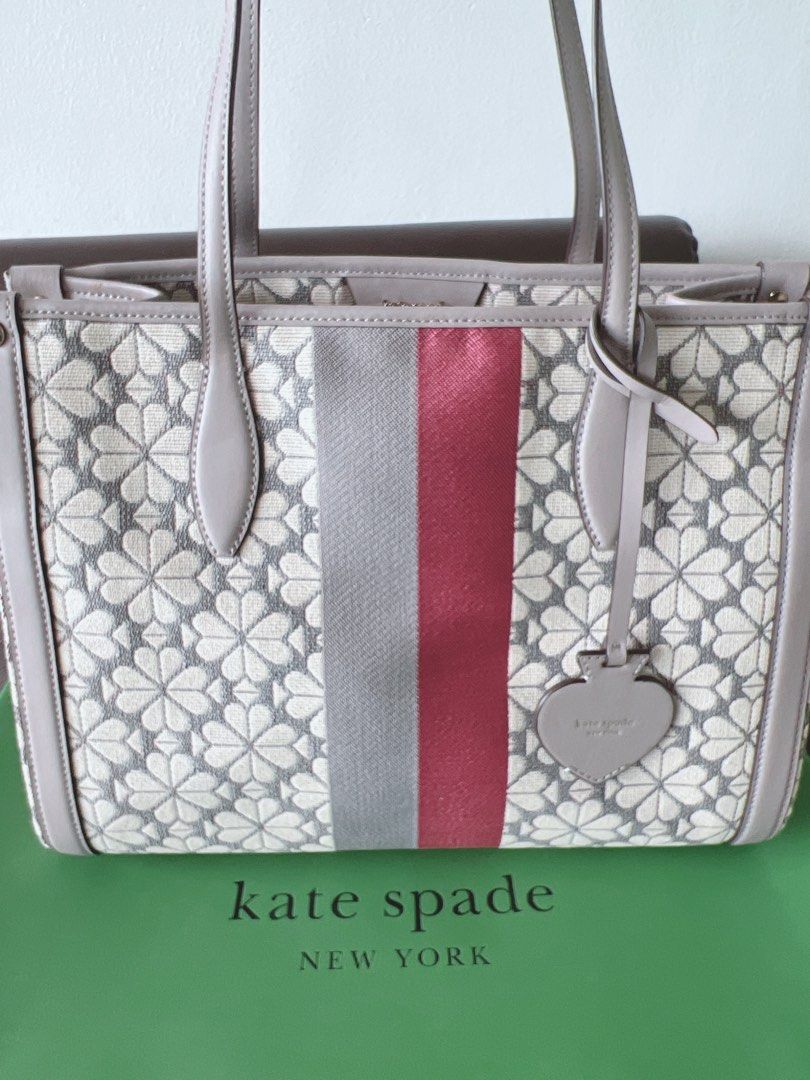 Kate Spade (Category: Luxury Bags & Wallets) located in Paranaque City. Submitted by nicetodealwith888 (Listing ID 1385144398, Image 2). Description: Kate Spade Spade Flower Jacquard Stripe Market Medium Tote Grey Multi DETAILS * 10.25”h x 11.75”w x 6.25”d * handle drop: 11” * spade flower jacquard with smooth leather trim * logo print faille lining * pinmount logo * tote with drop zip-top closure * interior snap pocket * interior slip pocket * i