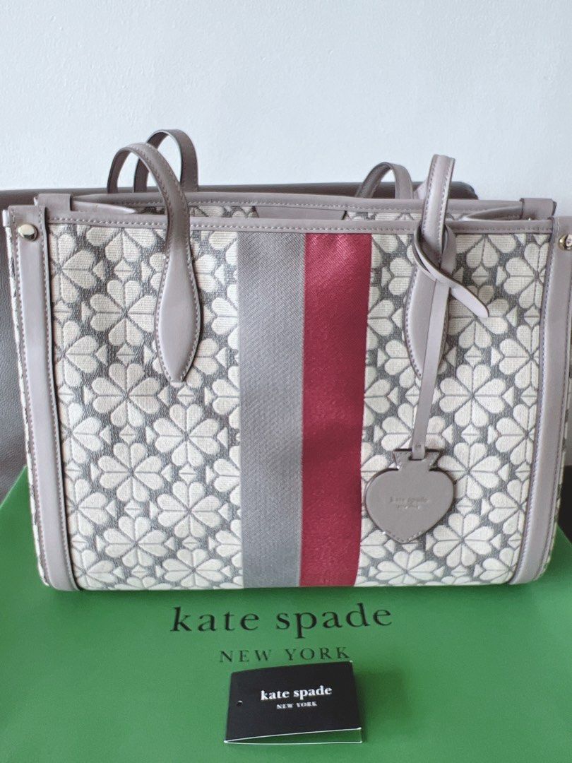 Kate Spade (Category: Luxury Bags & Wallets) located in Paranaque City. Submitted by nicetodealwith888 (Listing ID 1385144398, Image 1). Description: Kate Spade Spade Flower Jacquard Stripe Market Medium Tote Grey Multi DETAILS * 10.25”h x 11.75”w x 6.25”d * handle drop: 11” * spade flower jacquard with smooth leather trim * logo print faille lining * pinmount logo * tote with drop zip-top closure * interior snap pocket * interior slip pocket * i