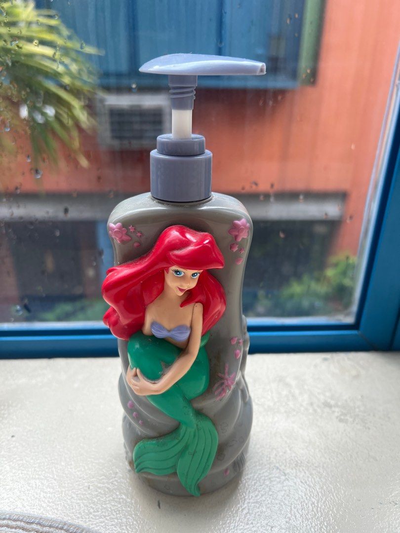 Little mermaid soap dispenser (Category: Bathtub & Bath Accessories) located in San Juan City. Submitted by iambernie (Listing ID 1385101636, Image 1). Description: A soap dispenser with the Disney Princess Ariel. Got this during my child’s days when she really loved Little Mermaid The original pump is not working so I can replace it with another pump that’s working ( color white) please see last pic Just refill the bottle with your favorite soap