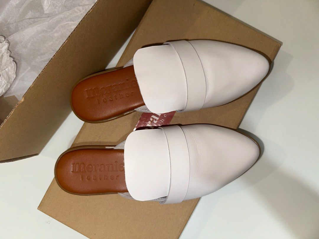 Meraniel Angie (Category: Slippers and slides) located in Makati City. Submitted by hellohooman (Listing ID 1385113423, Image 2). Description: Used once only. Like new Size 4, 21CM Original price: ₱2,490.