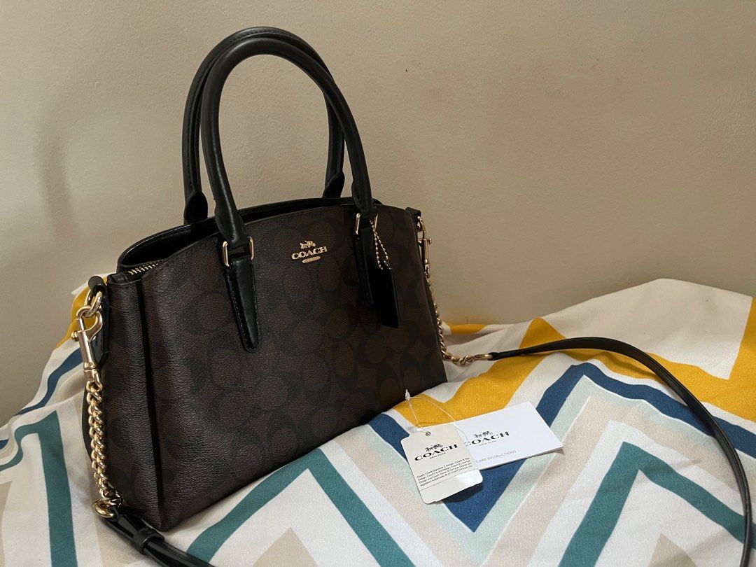 SELLING LOW: COACH MINI SAGE (Category: Luxury Bags & Wallets) located in Quezon City. Submitted by dropshopselections (Listing ID 1385189016, Image 2). Description: original approx 24 x 10 x 15 cm.