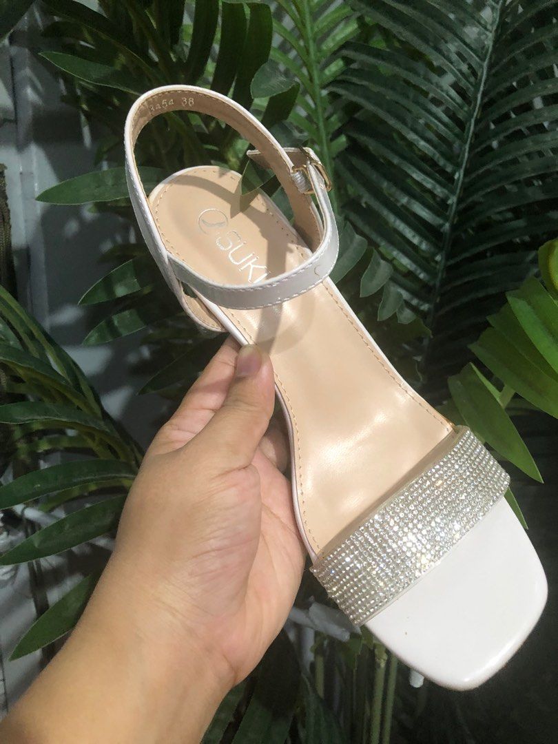 SUKI Rhinestone Clear Heeled Ankle Strap Sandals (Category: Heels) located in Caloocan City. Submitted by annacruzita (Listing ID 1385179391, Image 3). Description: Used as Bridal Shoes Size 38 Heel Height: 2 inches Rfs: Decluttering.