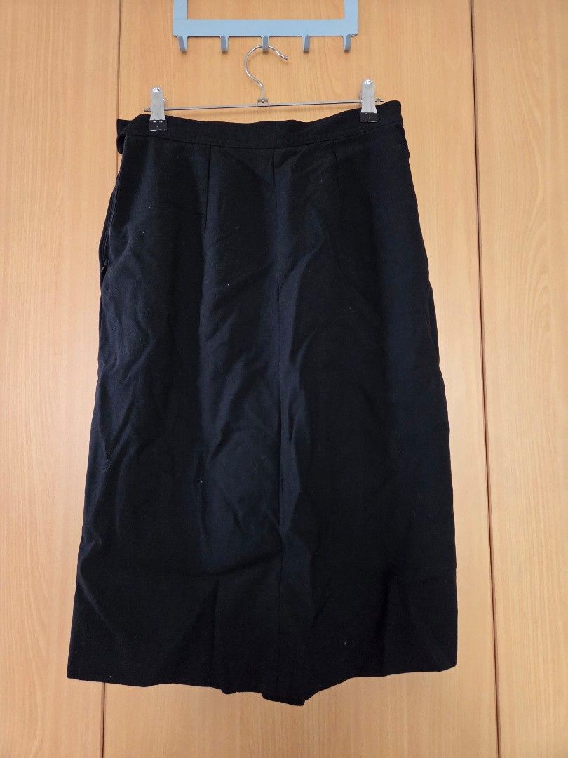 Valentino Black A Line Skirt (Category: Skirts) located in Quezon City. Submitted by theplushhaven (Listing ID 1385113167, Image 3). Description: authentic VALENTINO made in Italy a black a-line skirt with two pockets. with pleated bent in front Perfect for business attire. shipping fee will be shouldered by buyer..
