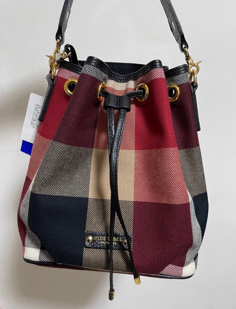 Blue label crestbridge bucket bag, Luxury, Bags & Wallets on Carousell