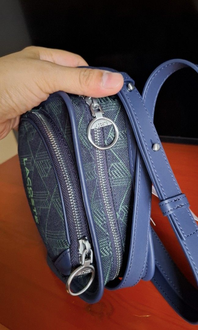 Brand new authentic la.coste shoulder bag (Category: Luxury Bags & Wallets) located in Cavite. Submitted by DocTina (Listing ID 1385297333, Image 3). Description: Personally bought in Bangkok a few days ago. buyer's remorse, and it's too small for my frame the more that i look at it. sf c/o buyer. meet up is possible (certain days) around quezon avenue, imus, bacoor, las pinas. guaranteed authentic..