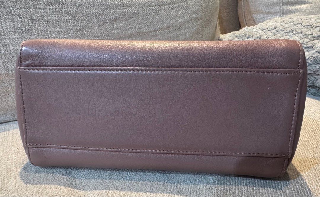 Fendi Peekaboo mini (Category: Luxury Bags & Wallets) located in Makati City. Submitted by carlysd (Listing ID 1385352071, Image 3). Description: Steal! Normally this bag costs 50k and up! 2 toned Rose and Light beige color. Interior color: mint green .