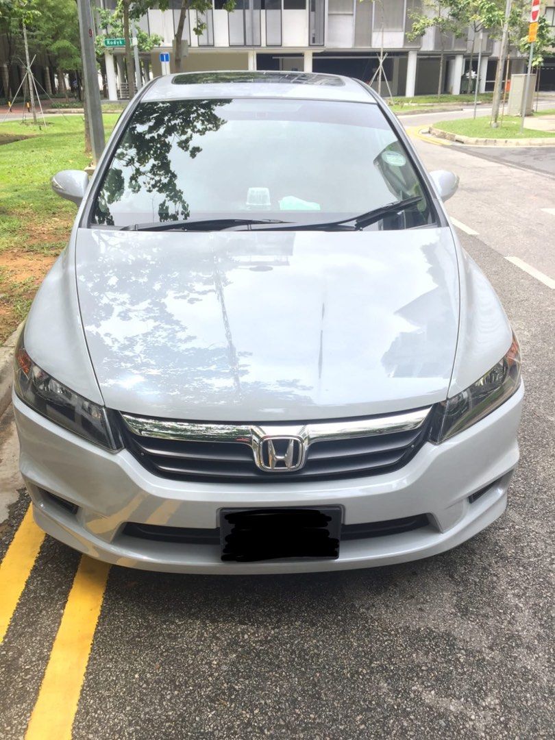 Honda Stream 1.8 RSZ Sunroof (A) (Category: Used Cars) located in Singapore. Submitted by siam_kia (Listing ID 1385290370, Image 1). Description: .