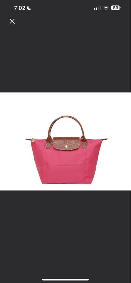 Longchamp Le Pliage Medium Short Handle (Category: Tote Bags) located in Cainta. Submitted by maple_mocha (Listing ID 1385358695, Image 1). Description: Original. Bought in Duty Free Fiesta Mall. This just needs a little cleaning. You can message me your price, I can try to haggle as long as the price’s reasonable. RFS: not using anymore..