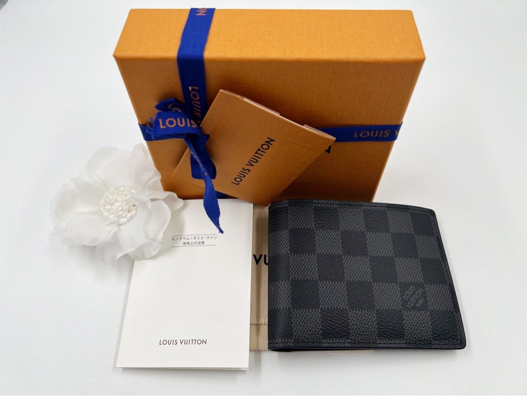 ⚜️Louis Vuitton Slender - Damier Graphite canvas wallet (Category: Luxury Bags & Wallets) located in Makati City. Submitted by 90sangel (Listing ID 1385309209, Image 2). Description: •Item: Louis Vuitton - Damier wallet 🩶🖤 •Size: 4.5 x 3.5 x 0.6" 3 credit cards slots 2 compartments for bills and tickets 2 side slots for receipts 2 business cards slots •Condition: As New! .