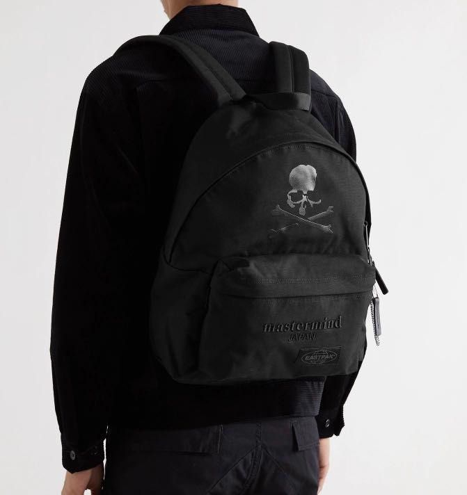 Mastermind x Eastpak Backpack (Category: Backpacks) located in Manila. Submitted by sc_rcity (Listing ID 1385426082, Image 1). Description: Technical canvas backpack in black. Tonal webbing carry handle at top. Twin adjustable padded shoulder straps. Tonal bonded logo, tonal embroidered logo, tonal textile logo patch, and zippered pocket at face. Zippered pocket at side. Tonal textile logo patch at back face. Two-way zip closure at main compartme