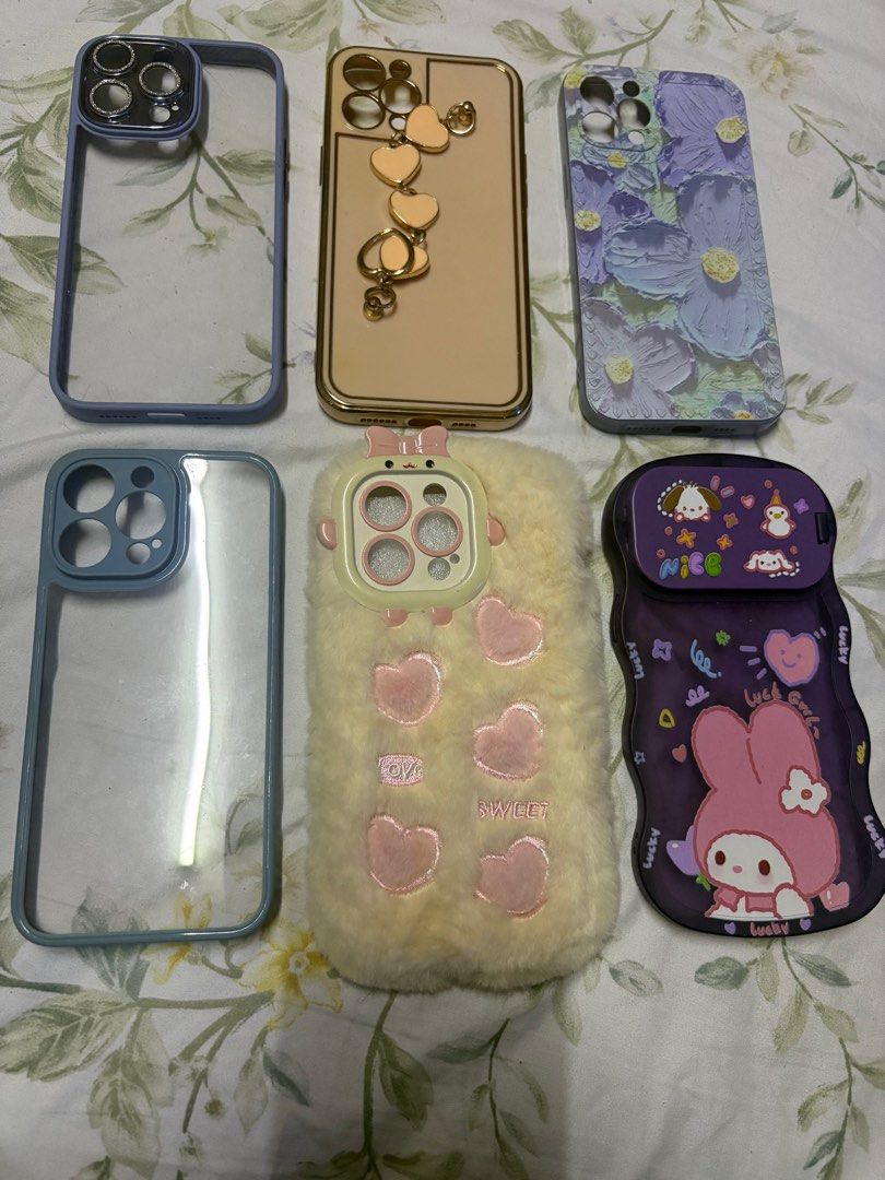 Phone case for iPhone 14 Pro Max (Category: Cases & Sleeves) located in Paranaque City. Submitted by shopofashopaholic (Listing ID 1385267441, Image 2). Description: First slide - brand new- 100 each Second slide - used - 25 each, take all 6 for 100 All no flaws and usable.