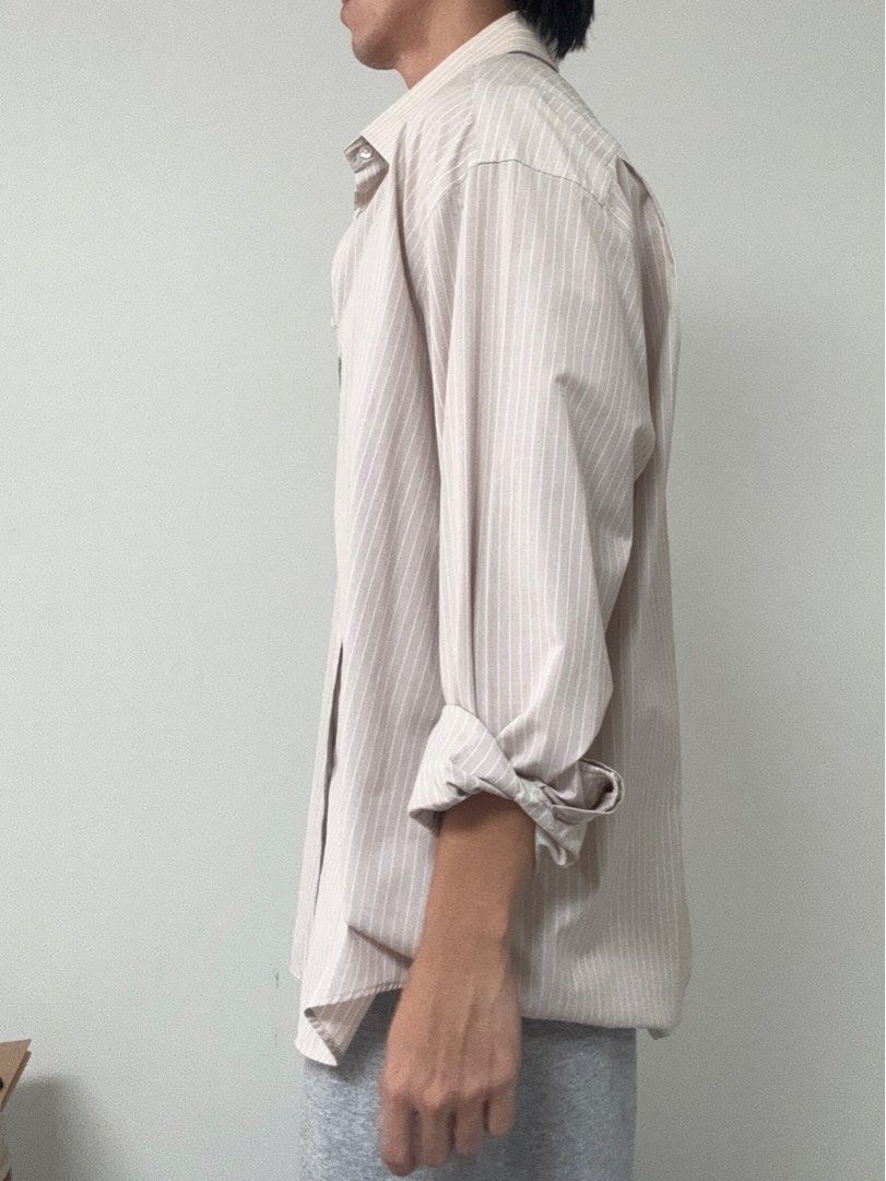 Thomas nash dress shirt (Category: Formal Shirts) located in Quezon City. Submitted by goodollovedgoods (Listing ID 1385316697, Image 2). Description: Thomas nash Brown stripped dress shirt In great condition 18.5 on tag Fits like 2xl 25x33 Issue yellowing collar 500.