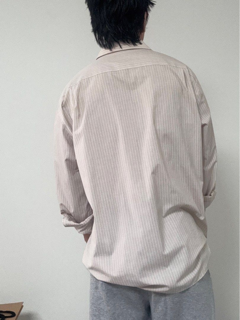 Thomas nash dress shirt (Category: Formal Shirts) located in Quezon City. Submitted by goodollovedgoods (Listing ID 1385316697, Image 3). Description: Thomas nash Brown stripped dress shirt In great condition 18.5 on tag Fits like 2xl 25x33 Issue yellowing collar 500.