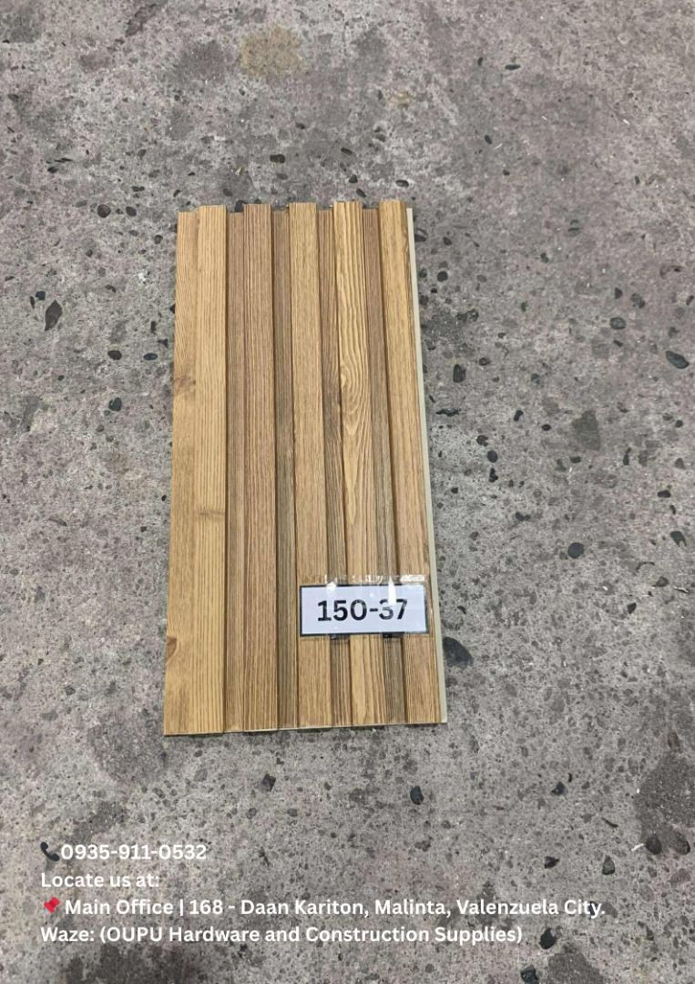Wall Cladding 5in1 (Category: Wall Decor) located in Caloocan City. Submitted by kazandra_rivera-37346 (Listing ID 1385279679, Image 3). Description: "Elevate your interiors with elegant WPC wall cladding." WPC WALL CLADDING (Indoor) (9.5FT.) • '3 in 1' - 2.9m X 20cm X 12mm • '4 in 1' - 2.95m X 15cm X 24mm • '5 in 1' - 2.9m X 15cm X 9mm • '6 in 1' - 2.9m x 16cm x 18mm • '7 in 1' - 2.9m x 20cm x 10mm ⏩ADVANTAGES⏪ √Lighter, waterproof, termite proo