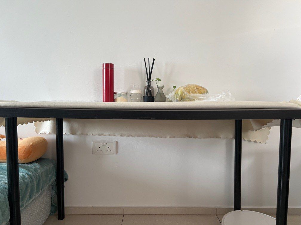 Black Rectangular Table (Category: Tables & Sets) located in Singapore. Submitted by love2nature (Listing ID 1379939690, Image 2). Description: This is a black rectangular table. It looks to be in great condition, legs can dismental. The table has a simple design, with a black tabletop and black legs. It would be perfect for a small apartment or a home office. It's a versatile piece of furniture that can be used for a variety of purposes, such as