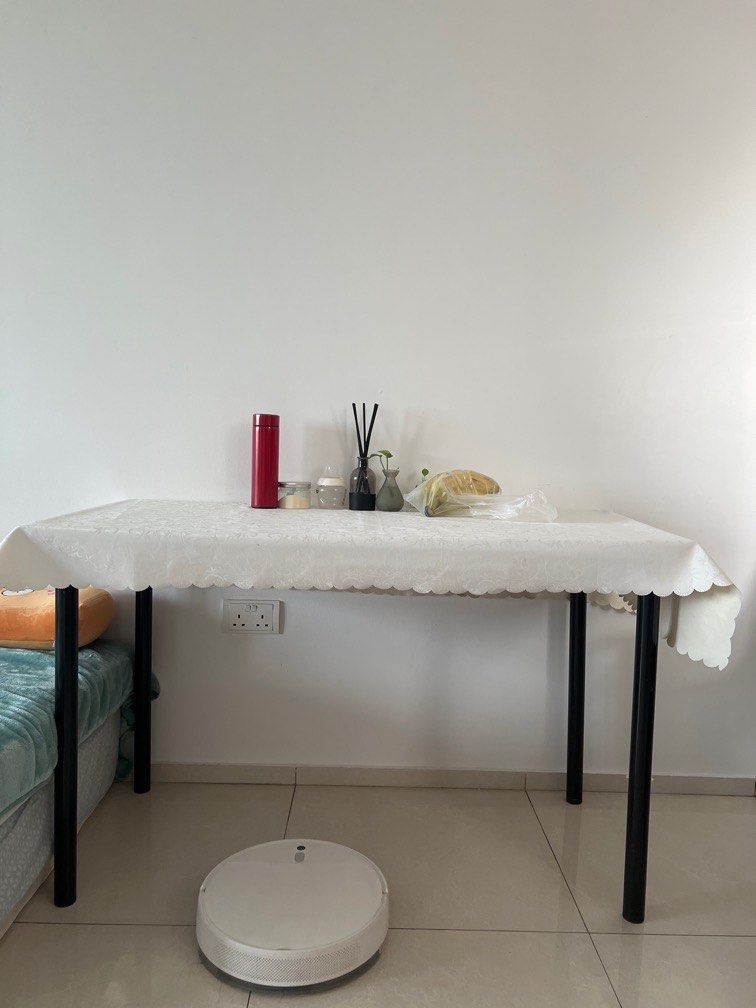 Black Rectangular Table (Category: Tables & Sets) located in Singapore. Submitted by love2nature (Listing ID 1379939690, Image 1). Description: This is a black rectangular table. It looks to be in great condition, legs can dismental. The table has a simple design, with a black tabletop and black legs. It would be perfect for a small apartment or a home office. It's a versatile piece of furniture that can be used for a variety of purposes, such as