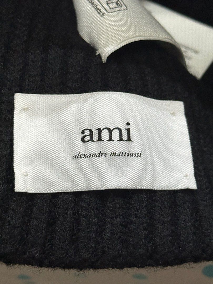 BLACK WOOL AMI DE COEUR BEANIE (Category: Beanies) located in Las Pinas. Submitted by billbars (Listing ID 1385546446, Image 2). Description: SRP: Php 10,600 Selling for only Php 5,000 Slightly Negotiable Opening - 10 inches in width Height - 6.8 inches in height Beanie in wool knit Unisex product Ribbed stitch Ami de Coeur patch Made in Italy Bought in Japan Feel free to send a message!.