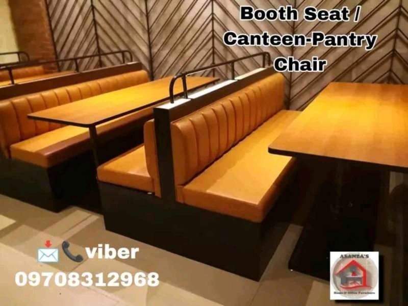 booth seat /pantry chair (Category: Other Home Furniture) located in Quezon City. Submitted by asanzasmik45405 (Listing ID 1385434069, Image 1). Description: A booth seat is a type of semi-private, built-in or freestanding seating unit, often found in restaurants, cafes, and other hospitality venues, that combines two or more banquette-style benches and a table to create an intimate, enclosed "room within a room" for diners. Booths can be straigh