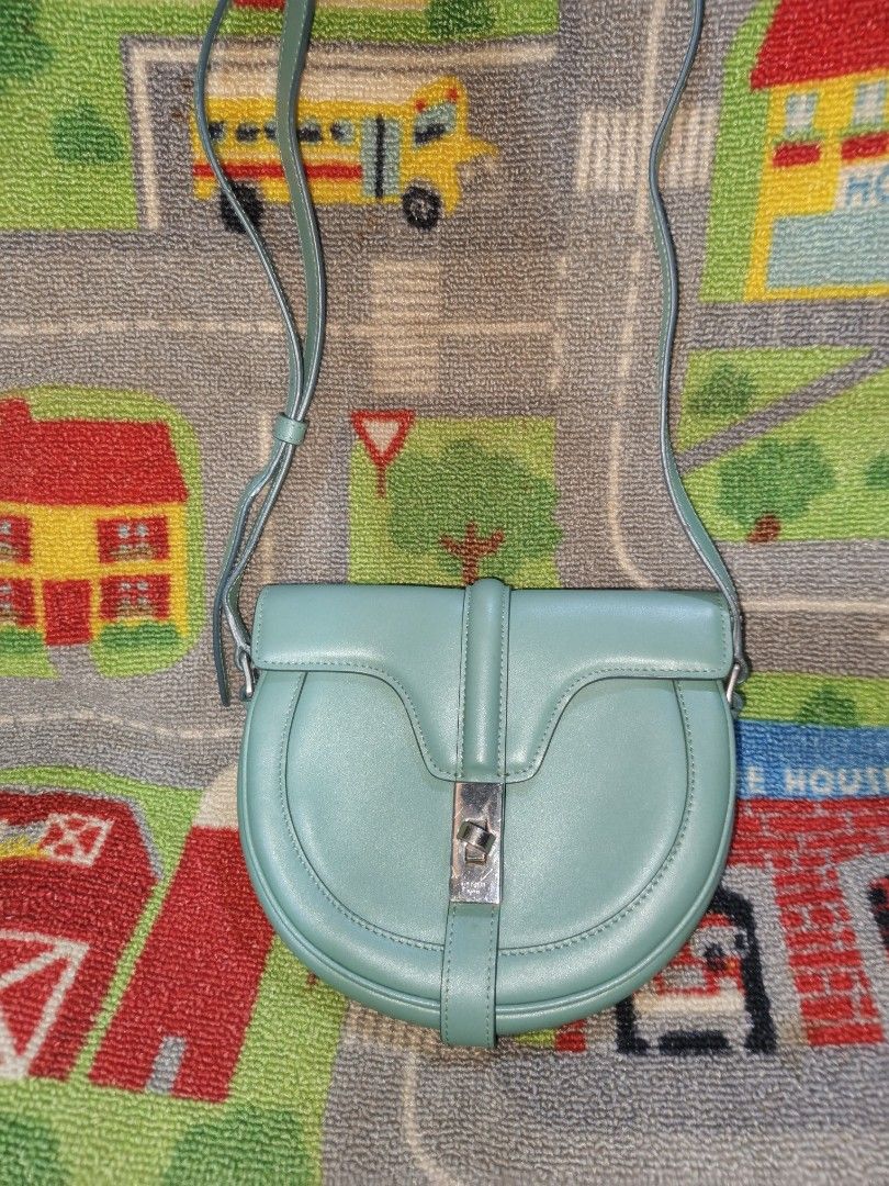 Celine small sling bag (Category: Luxury Bags & Wallets) located in Davao. Submitted by ukaystuff07 (Listing ID 1385610383, Image 2). Description: preloved from Korean box >leather >excellent condition >small wallet and cp lng kasya >no flaws >ang GANDA😍🥰😍.