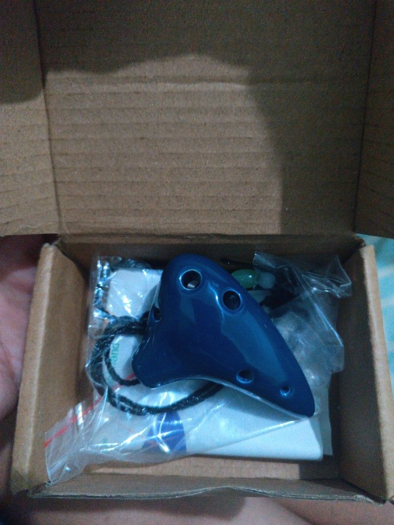 Ceramic Ocarina - Made in China (Category: Musical Instruments) located in Muntinlupa City. Submitted by kittymeowcute (Listing ID 1385574744, Image 3). Description: 6 Hole Ceramic Ocarina, pwedeng necklace, brand new pa. Supposed gift sa pamangkin but they don't know how to use it. 170 each. 300 nalang kung kukunin pareho.