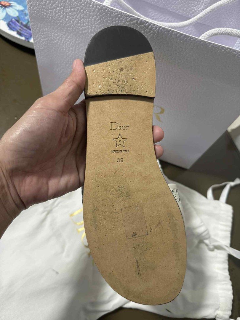 Dior D-Lane Slide (Category: Flats & Sandals) located in Quezon City. Submitted by jayzz1 (Listing ID 1385498333, Image 2). Description: - Lightly used -Guaranteed Original. Moneyback if proven fake. - Size 8 W - Purchased in Solaire - With dustbag - No box PM for more pics :) 📍Quezon City.