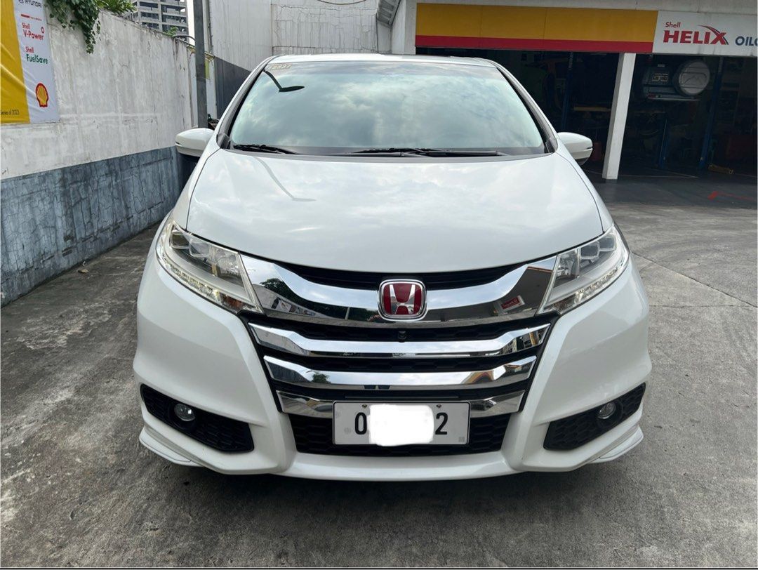 Honda Odyssey 2.4 EX Navi Auto (Category: Used Cars) located in Quezon City. Submitted by cojingjt (Listing ID 1385533269, Image 1). Description: 2015 Honda Odyssey EX Navi 36k km only Pearl White Ceramic Coated Ceramic Tint Very Cold Aircon Automatic sliding doors New battery Newly service brakes No scrathes/dents No history of accident/flood free Very fresh / well maintained Special Plate 2 Original Keys Owner/Seller 09175367065 Diliman QC area