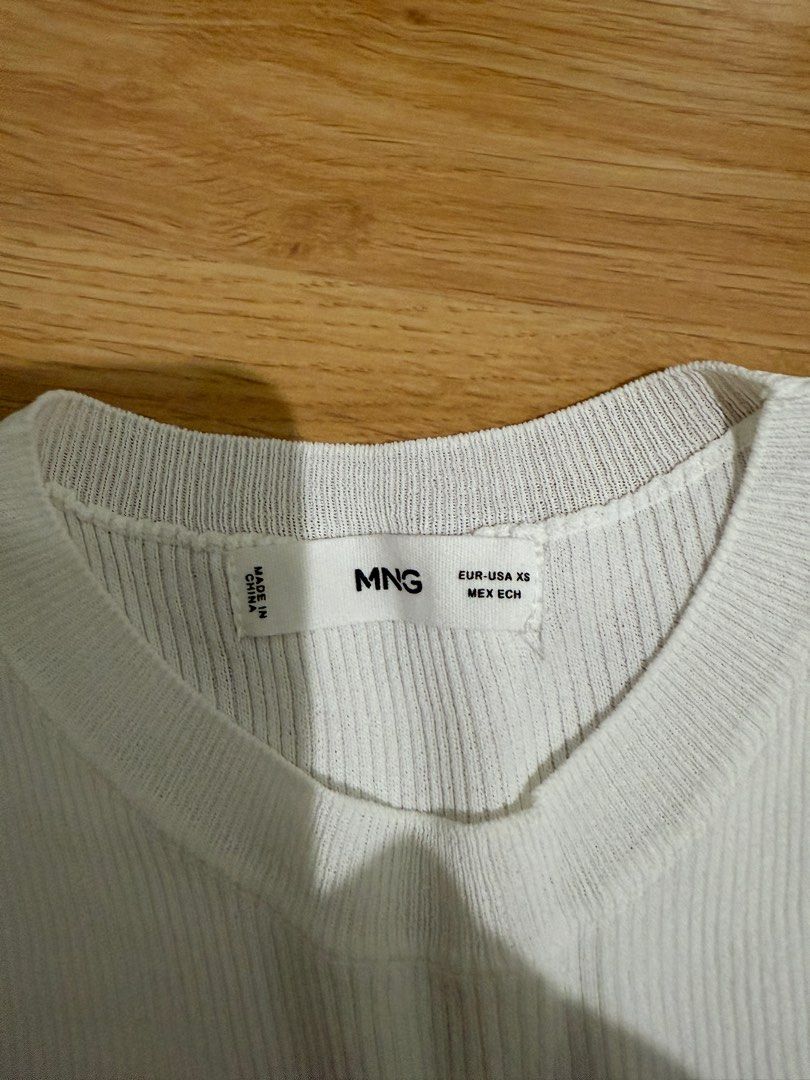 Mango Ribbed Top (Category: Sleeveless) located in Davao. Submitted by thearchiveedit (Listing ID 1385585580, Image 2). Description: - No “when worn” requests Seller’s measurements: 5’2, 41kg, 32-24-32. Bottoms are tailored to fit seller. - No lowballing - No joy reservers - Most items are in pristine condition(barely used, used once) - All items are guaranteed AUTHENTIC.