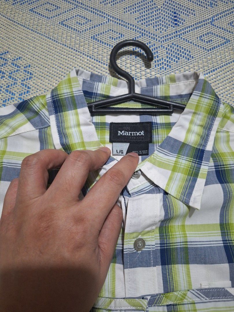 Marmot Checkered Polo Size US Large (Category: Tshirts & Polo Shirts ) located in Quezon City. Submitted by SecretFlutePlayer (Listing ID 1385594039, Image 2). Description: Marmot Short Sleeve Polo No Tag Available Padala From USA Unwanted gift= di kasya sa akin masikip Chest: 23inches based on my tape measure Length: 30 inches.