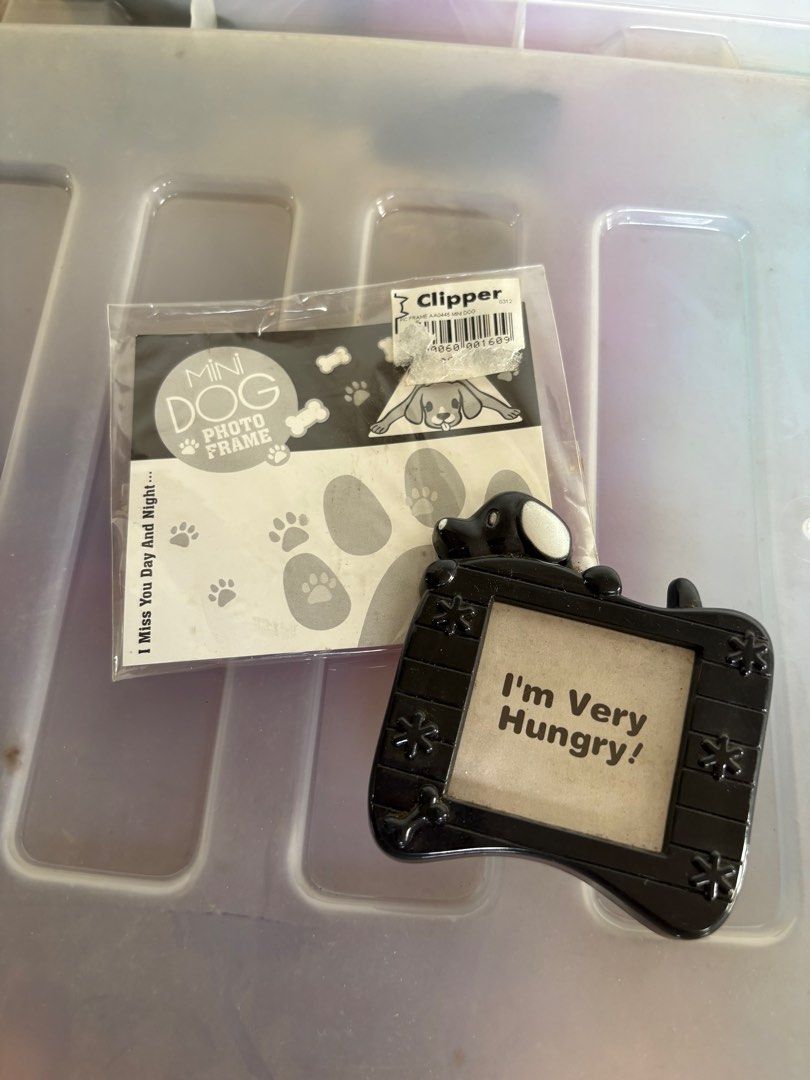 Mini Dog Picture Frame (Category: Frames & Pictures) located in Quezon City. Submitted by meggys_treasures (Listing ID 1385555585, Image 1). Description: > Cute mini Dog picture frame > Never been used but old stocks. Please manage your expectations..